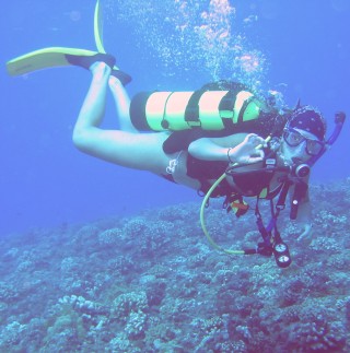 Amanda gives the OK sign on a dive in Tahiti.