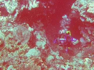 Amanda emerging from the swim-through out of Swallow's Cave