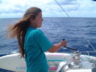 Amanda winches in the jib