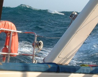 Big waves looking off the quarter from the companionway