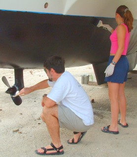 Touching up the bottom paint before launching