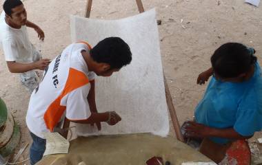 Golf, Boy, & Houa laying glass on top of the foam extension