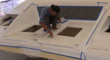 Jack touching up some spots on the foredeck