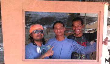 Chai, Houa & Baw, our leaders, with Houa's woodwork