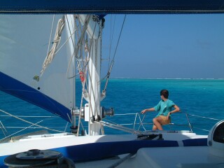 Chris on the bow as we dodge reefs in Los Roques