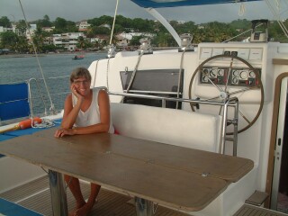 Sue in Ocelot's cockpit.  We eat most meals out here.