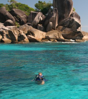 Rachel preparing to descend for a dive in the clear waters of the Similans