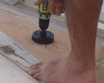 Jon drilling out the foam where the bow cleats will go