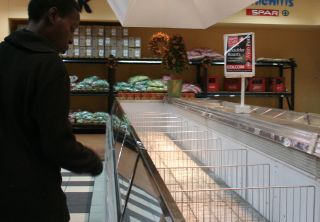Empty shelves at a big grocery chain in Harare