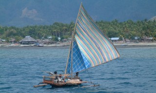 Outrigger fishing boat, off Flores
