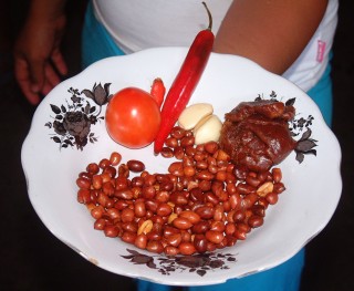 Karol displaying the peanut sauce ingredients