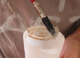 Fully cured epoxy is HARD, and comes out of polyethylene cups