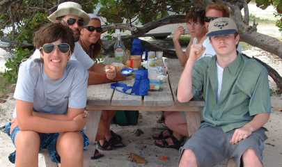 Picnic on a St. Martin beach - fresh French bread, cheese, sausage, beer, chips - YUM