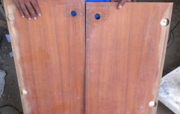 Houa's cabinet doors, with new teak on the outer edges