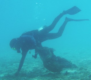 We cleaned 4 big bags of trash off the sea floor