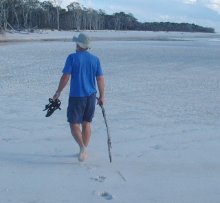 Jon and his dingo stick on Fraser Island