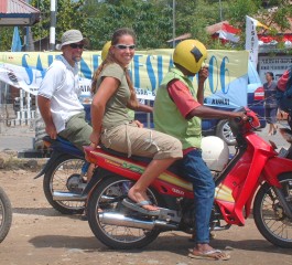 Amanda and Jon in the motorcycle parade, Lembata