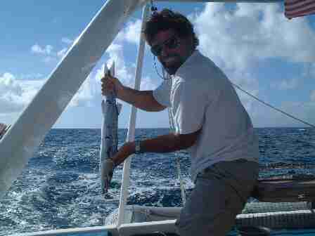 Dad with the baby barracuda we caught