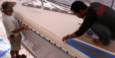 Jon and Baw aligning the starboard bow nonskid section