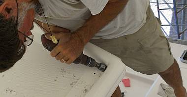 Drilling out the water-catch hole to the bimini leg