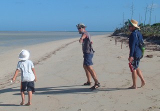 Jon walks the beach at Morris Island with cruising friends