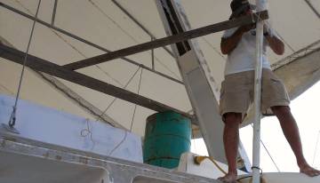 Jon reassembling the scaffolding around the targa-bar