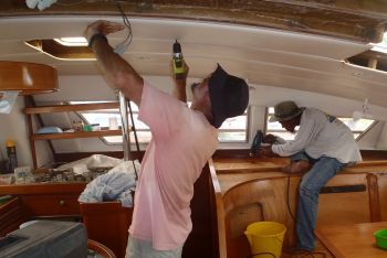 Jon taking off the salon headliner - an all-day job