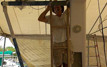 Jon lashing on a bamboo ladder to get on top of the targa-bar