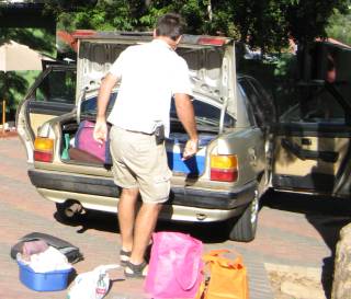 Unloading the jigsaw puzzle of stuff in the boot