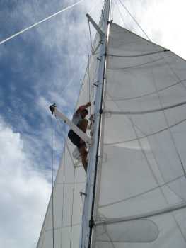 Jon up the mast at sea