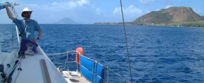 Sailing past the fort on Brimstone Hill, St. Kitts, with St. Eustatia in the background