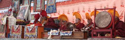 The monks watched everything from a raised platform