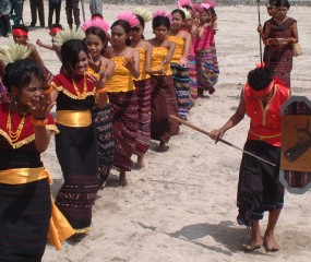 Children in tradional ikat clothing, at the welcome dance, Lewoleba.