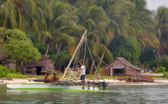 A Ninigoan sailing canoe partially rigged