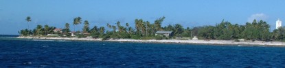 Village on Makemo atoll as we enter through the cut