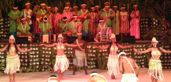 Beautiful Polynesian dancers in shell skirts