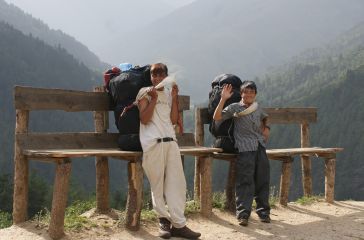 Our porters Bowen and Santos at a "pack-rest" stop