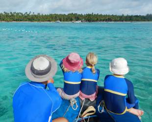 Heading for shore over clear blue water