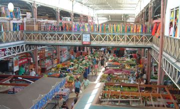 The two-story market in Papeete houses dozens of tiny stalls
