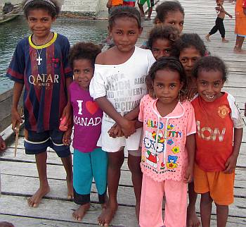 Curious kids on the dock, Salawati village