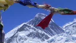 Mt Everest, or Chomolungma, under prayer flags