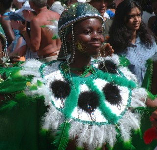 One of many happy dancers, all in the finest Carnival costumes.