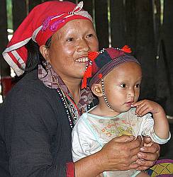 A Red Dao woman with her baby