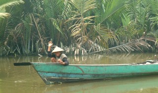 A Dayak fisherman on the river