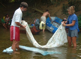 Rinsing the salt out of everything up a San Blas river