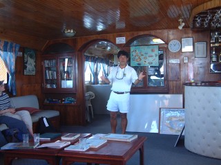Rodrigo, our naturalist, gives an evening briefing while we finish our sundowners