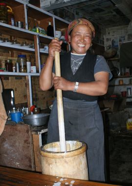 Sherpani churning butter
