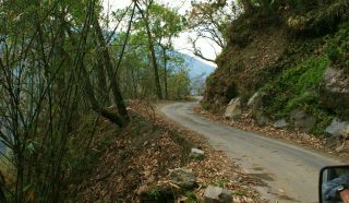 Narrow roads on steep hillsides going to Yuksam, Sikkim, India