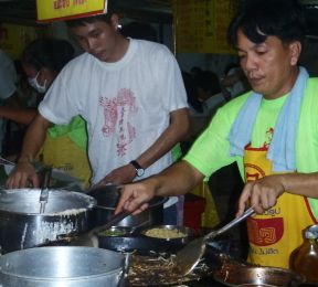 Street food vendors at the Phuket Vegetarian Festival, Thailand