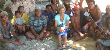 Sue with local fishing families. Her Bahasa paid off!